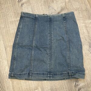 Free people denim mini skirt. Stretchy & form flattering. Size 6 but can be 4-8
